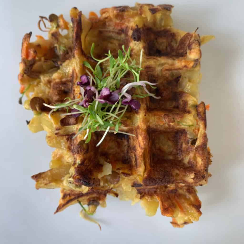 Veggie waffles with sprouts. 