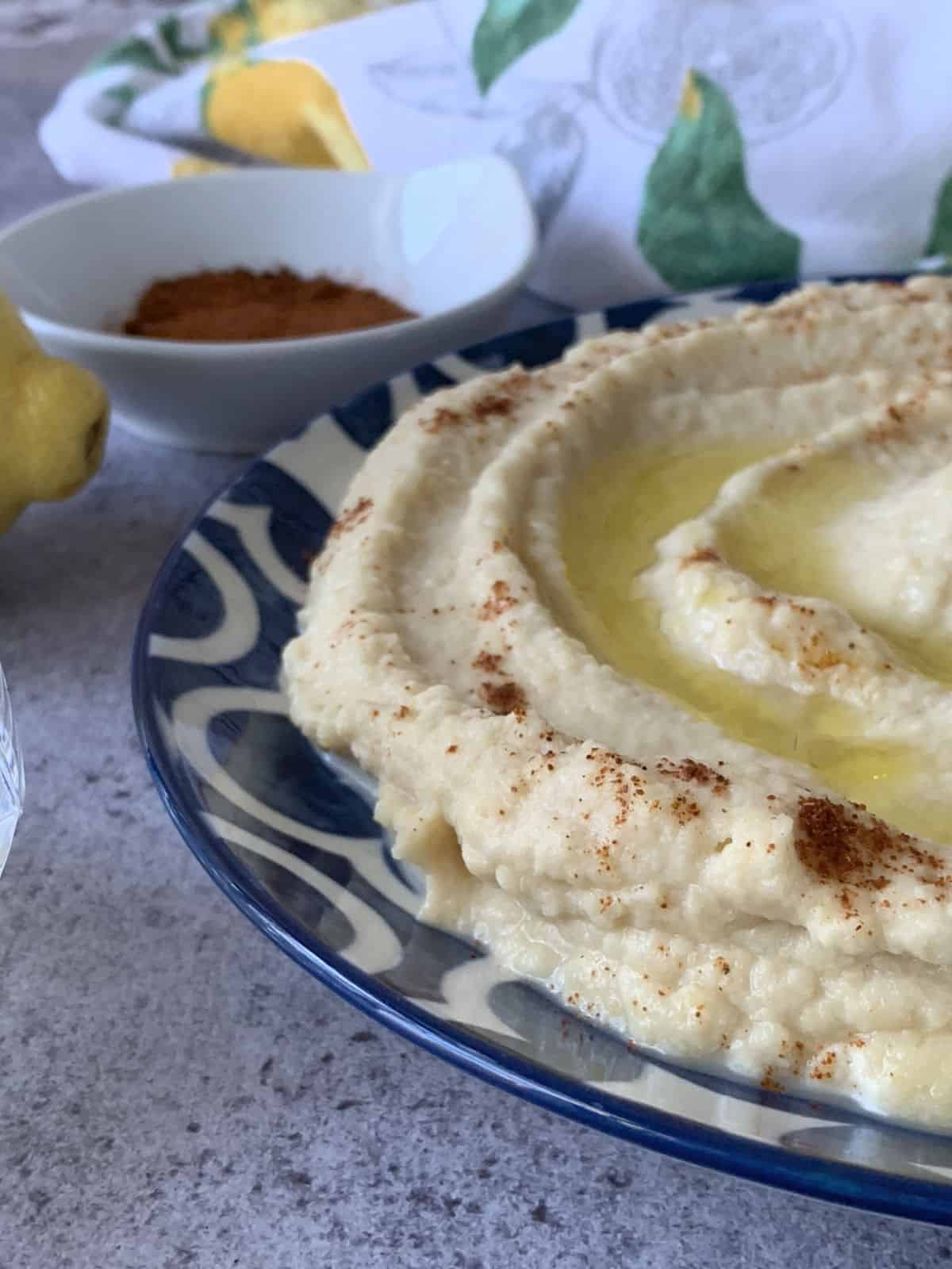Creamy hummus from the side.