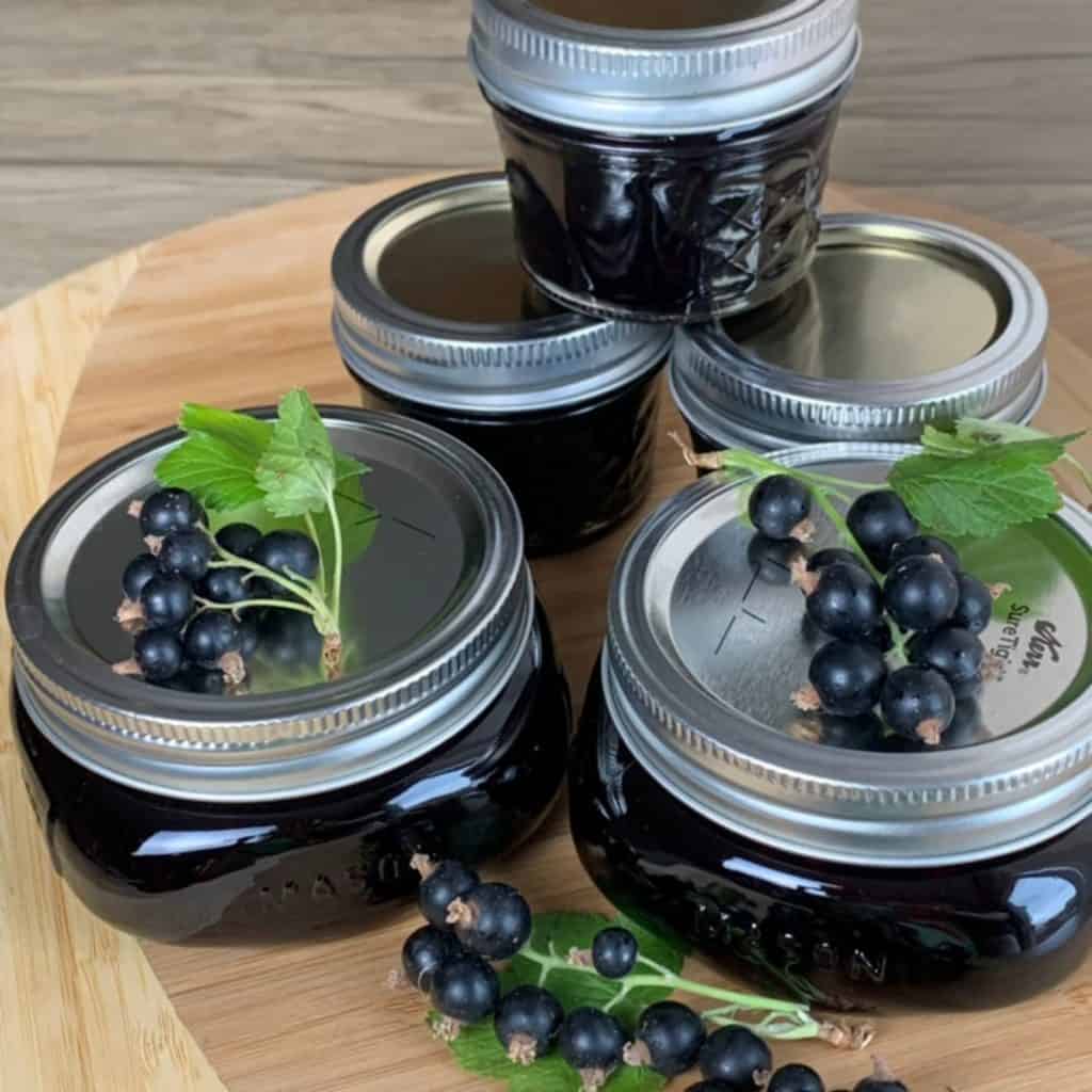 Blackcurrant jam in the jars.