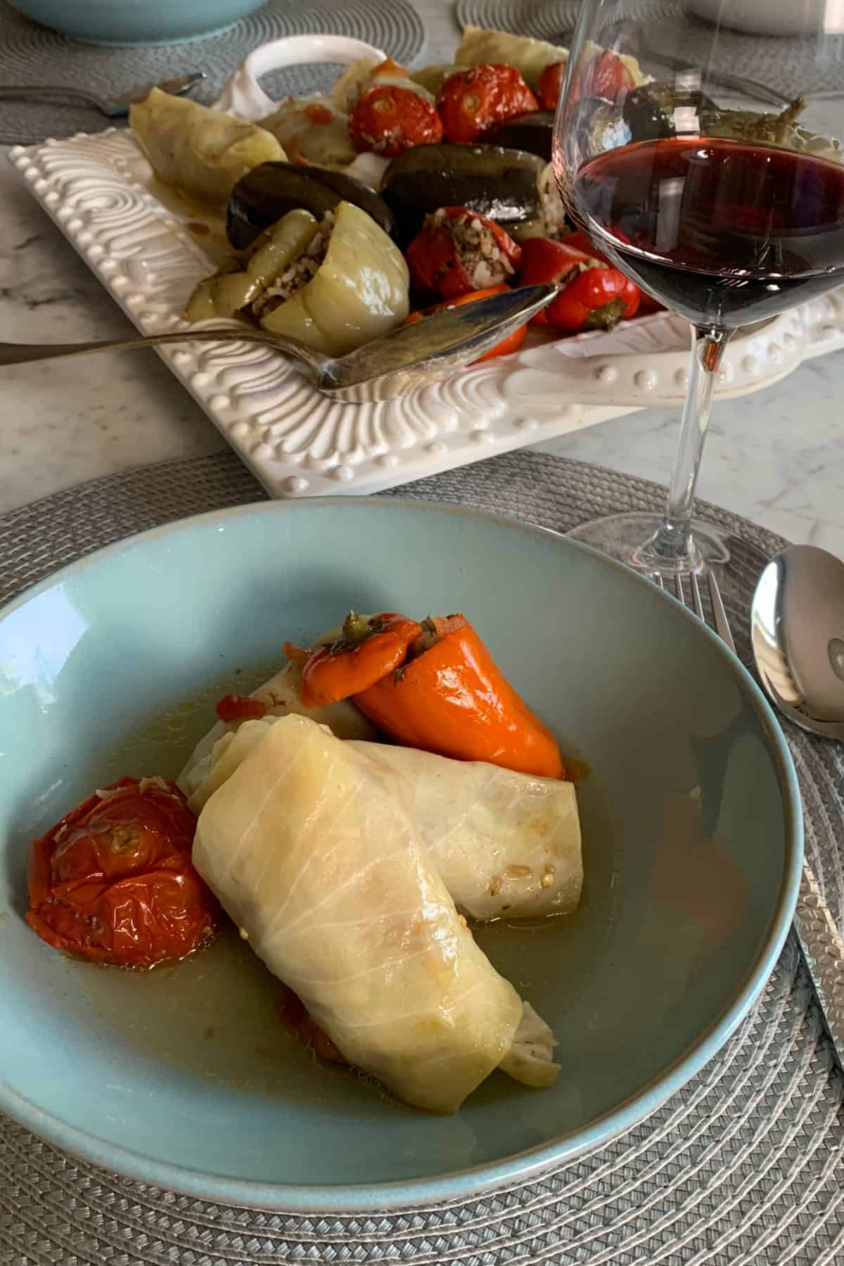 Stuffed cabbage, pepper, tomatoes in a light broth.