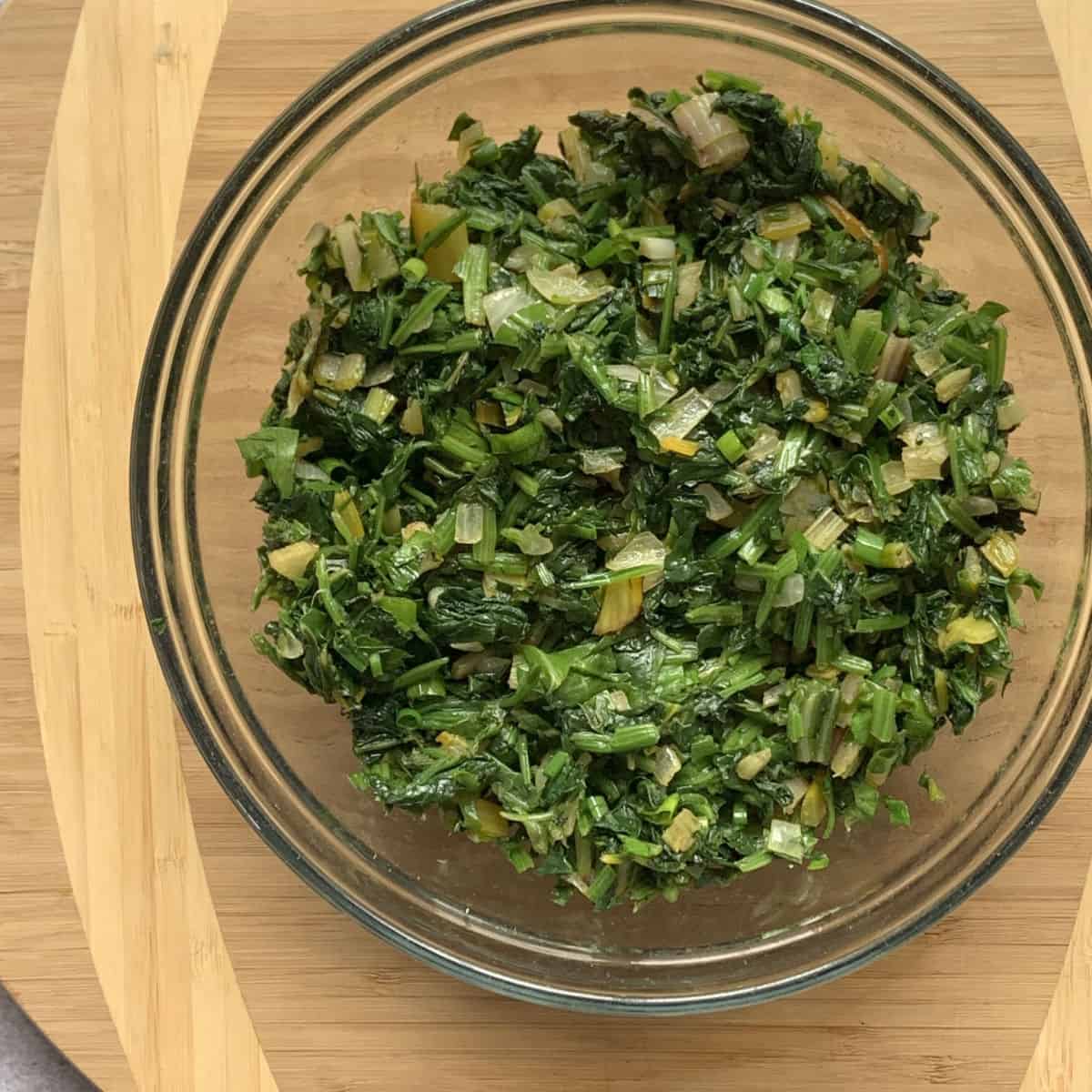 Spinach mixture in a glass bowl. 
