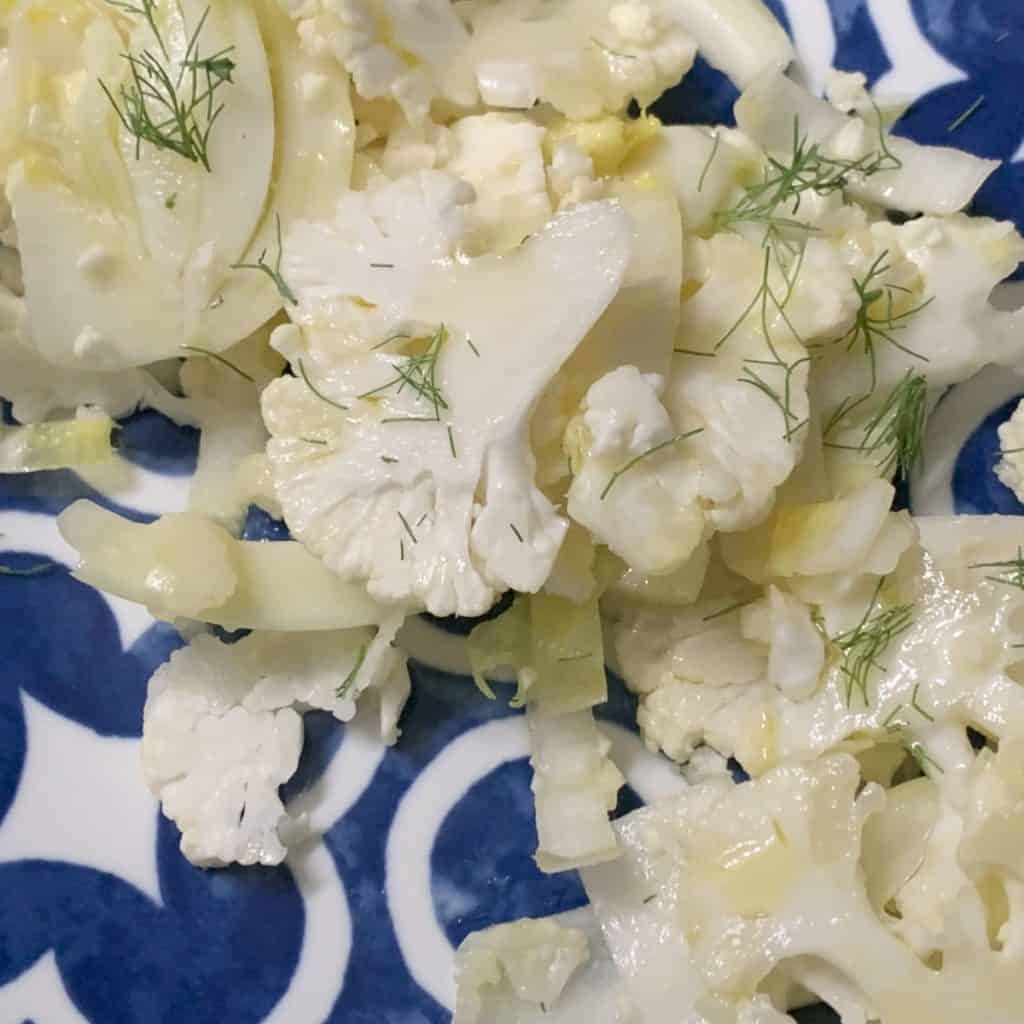 Shaved Cauliflower and Endive Salad on a plate.