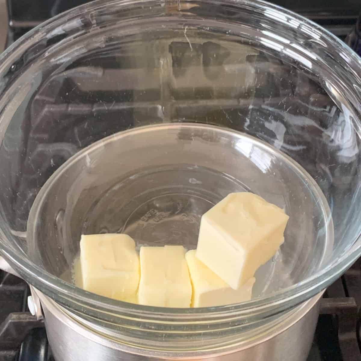 Melting butter in double boiler.